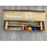 A croquet set in original box