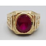 Brand new ex display 14ct gold & red stone ring, size V, 8.1g gross