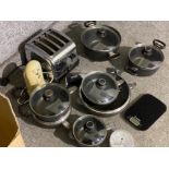 Box of miscellaneous kitchenalia including German woll pans, 4 slot toaster etc