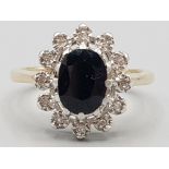 Ladies 9ct yellow gold sapphire and diamond cluster ring 2.8g gross size L