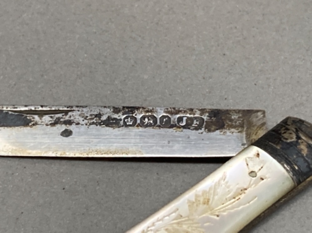 A Victorian silver and mother of pearl fruit knife, a steel folding knife, and a white metal - Image 2 of 3