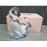 Nao by lladro figure 1391 girl holding on to hat