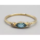 Brand new ex display 10ct gold & light blue stone ring, size N, 1.1g