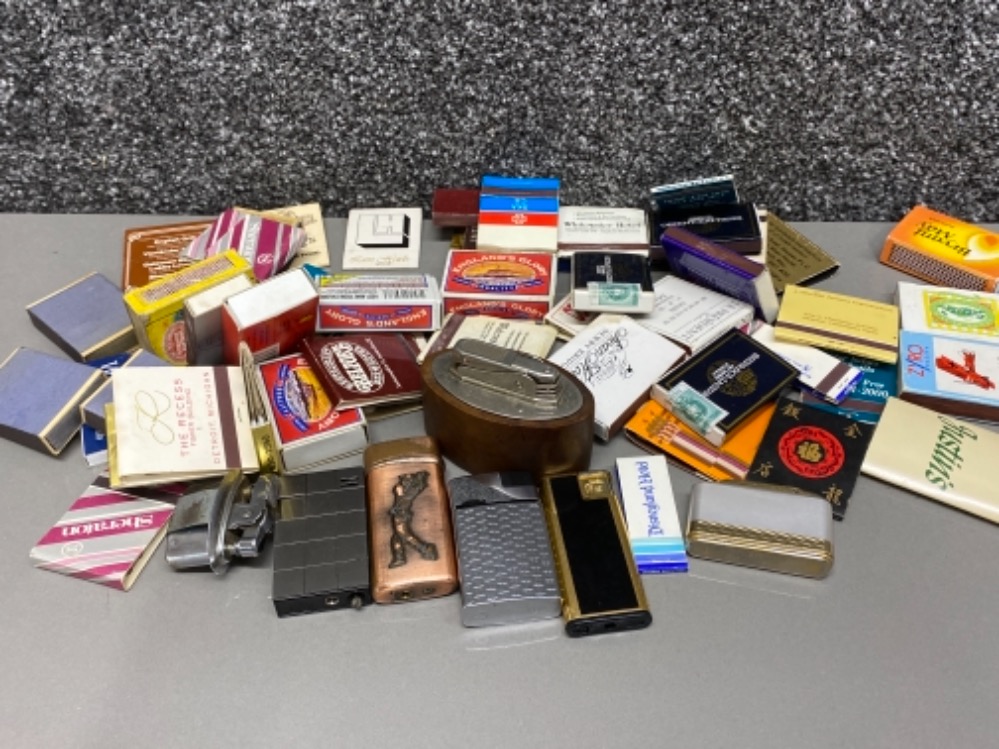 Box containing a large quantity of vintage matchboxes together with novelty & table lighters