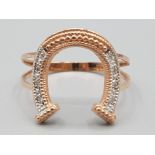 Brand new ex display 10ct rose gold & diamond horseshoe ring, size P, 2.1g