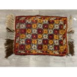 A Middle Eastern fringed prayer rug 66 x 50cm