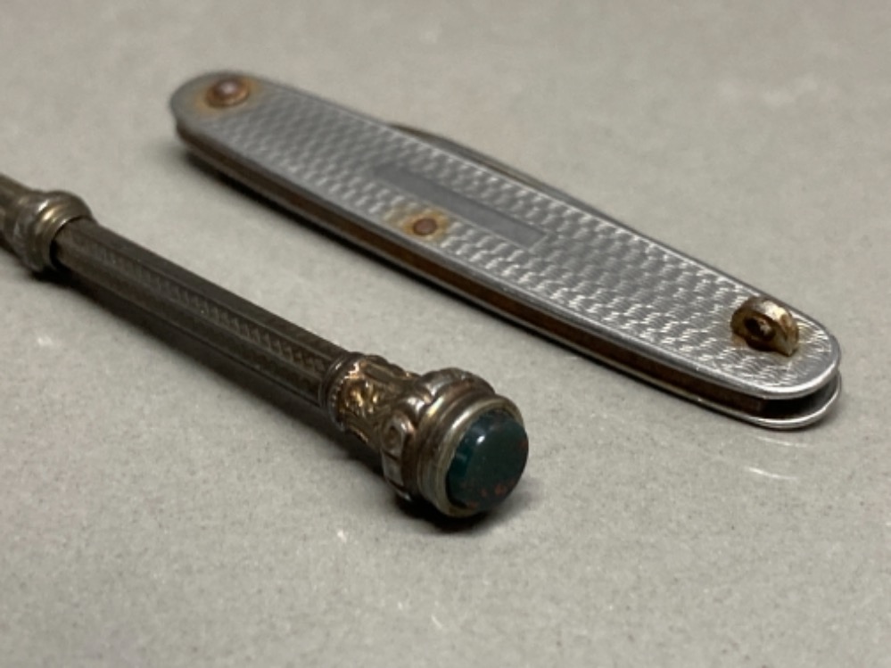 A Victorian silver and mother of pearl fruit knife, a steel folding knife, and a white metal - Image 3 of 3