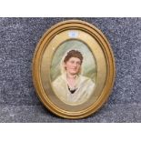 An early 20th century oil painting of a lady by E Patterson signed and dated 1919 29 x 20cm