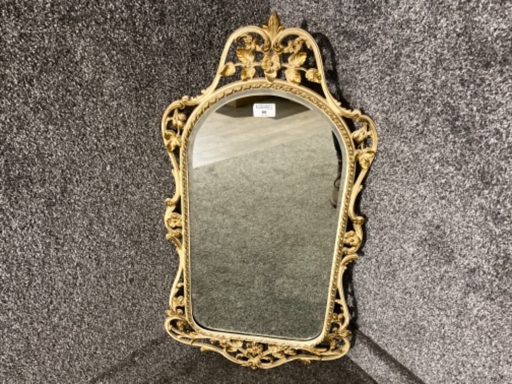 A modern bevelled wall mirror in cream and gilt metal frame 84.5cm high