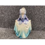 A German porcelain figure of a 19th century lady 31.5cm high