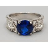 Brand new ex display 14ct gold & blue stone ring, size K, 3.4g