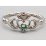 Brand new ex display 10ct white gold & green stone claddagh ring, size P, 2g gross