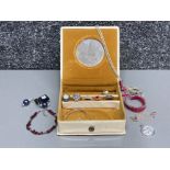 Cream box containing silver and white metal jewellery