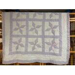 A Durham style double bed quilt with star pattern