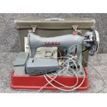 Vintage Jones sewing machine (model D-65) with original carry case