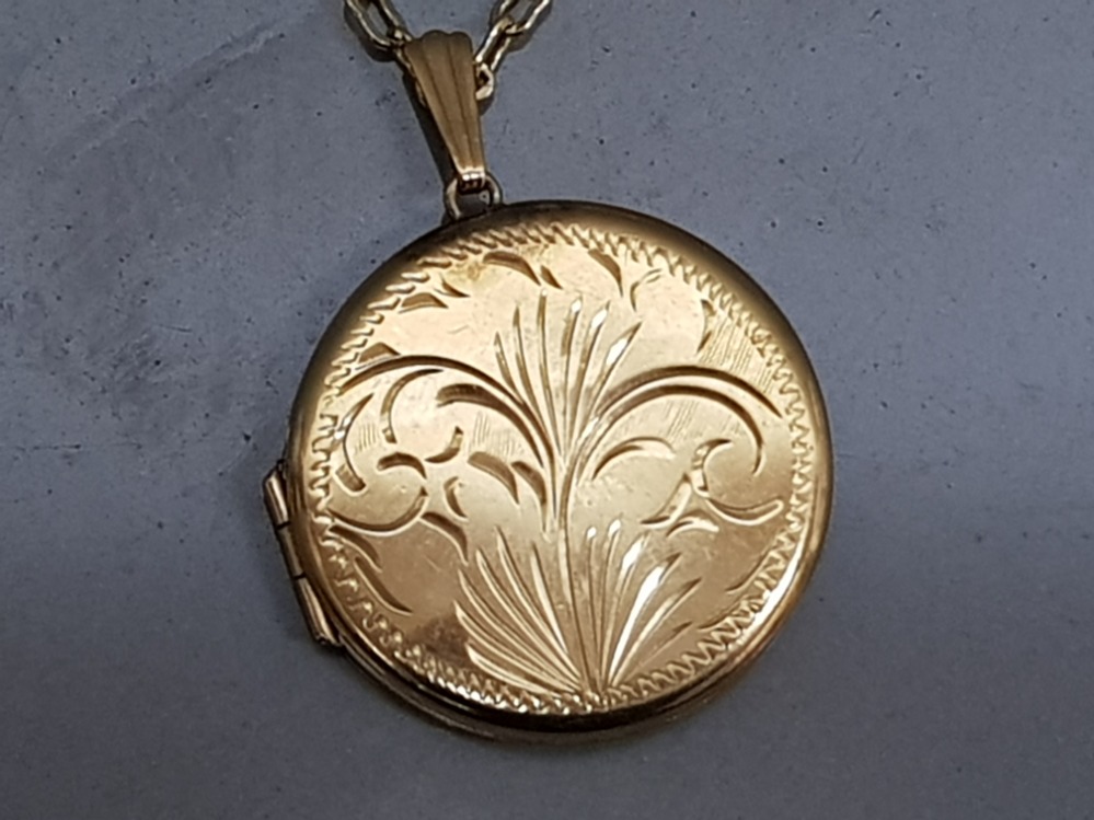 Circular Rolled Gold locket on gold plated chain