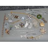 Tub of Diamante costume jewellery, necklaces, bracelets, brooches etc