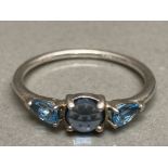 A silver and blue paste three stone ring size O 1.7g gross