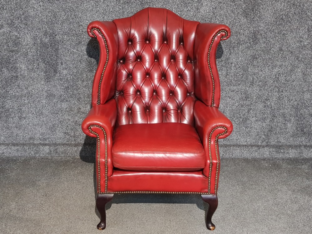 Oxblood leather Chesterfield wing back armchair