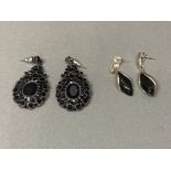 A pair of silver and French jet drop earrings, and another pair of earrings by Monet