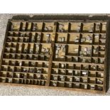Antique wooden printers tray with contents