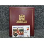 The World cup collection folder containing a large Quantity of stamps, plus 2 collectable coins etc,