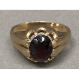 A 9ct yellow gold and garnet ring size O 4.2g gross