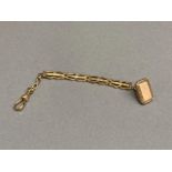 A gilt metal fob