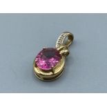 9ct Gold Stunning Diamond & Pink Stone Pendant weighing 3.8 grams