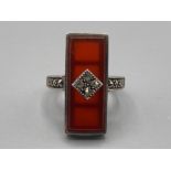 A silver, marcasite and red stone dress ring 6.5g gross size O