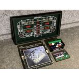 Texas Hold’em poker set - cards, chips & game mat together with a Las Vegas game board & all glass