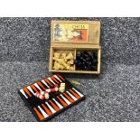 Vintage wooden box containing hand carved chess pieces, also includes a travel backgammon set