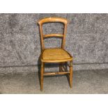 Mahogany bedroom chair with wicker seat