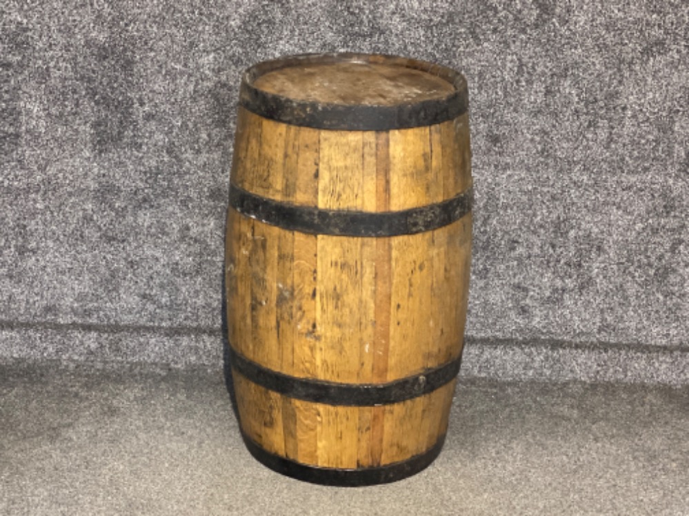 An oak coopered barrel, height 89cm
