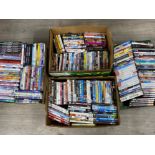 4 boxes containing a large quantity of miscellaneous DVDs
