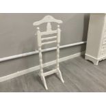 A white painted wooden valet stand