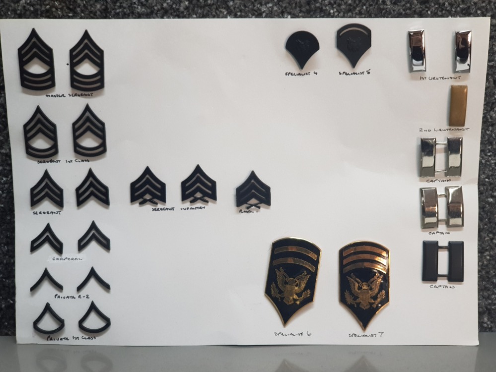 Selection of Military army rank badges, 25 in total including Master Sergeant, Captain, Specialist 6