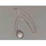 A silver locket on silver chain 4.1g gross