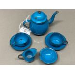 A blue enamel nursery tea set