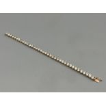 9ct gold ladies CZ tennis bracelet. Comprising of 37 round stones set in claw settings. 15g