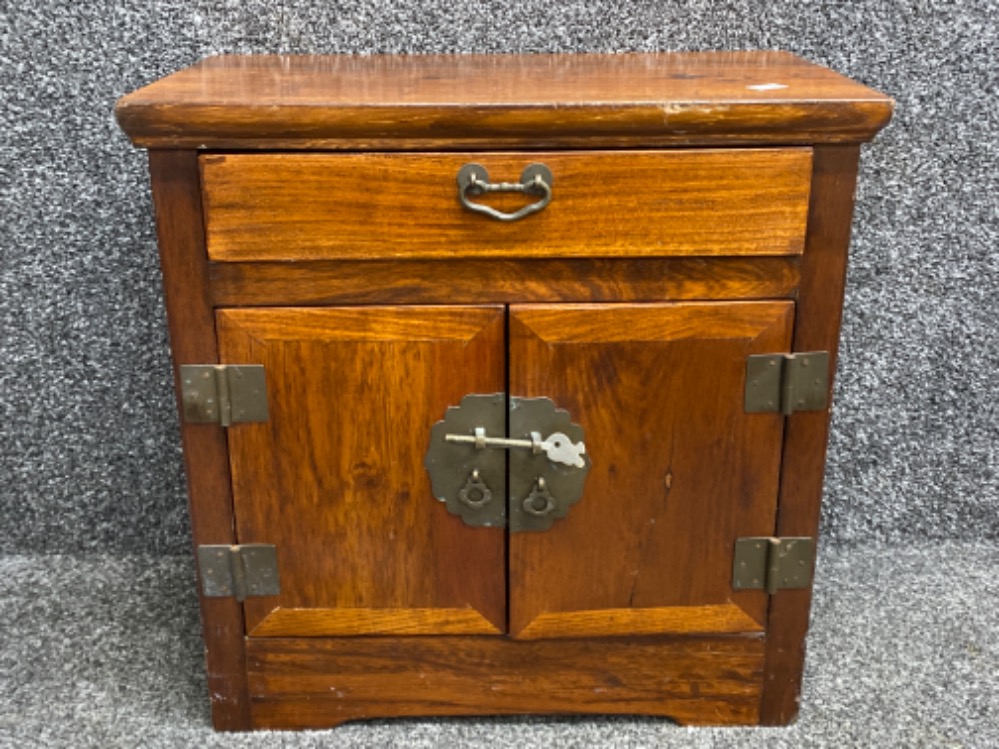 Oriental style hardwood & metal lined miniature cupboard with metal pin