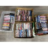 4x boxes containing a large quantity of miscellaneous DVDs