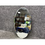 Antique frameless oval shaped mirror 33x56cm