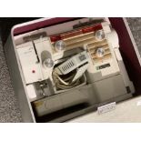 Vintage NewHome sewing machine with original case