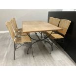 Wooden and metalwork dining table and six cane work and metalwork chairs