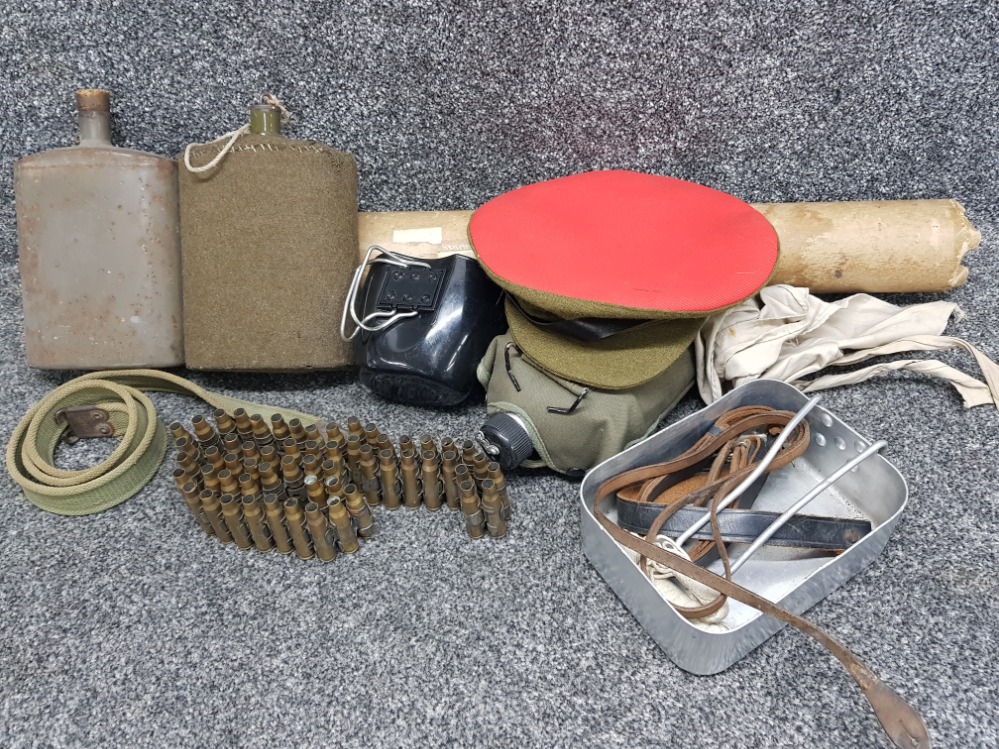 Box containing military related items including Machine gun belt, Canteens, rifle sling, nautical