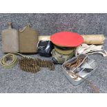 Box containing military related items including Machine gun belt, Canteens, rifle sling, nautical