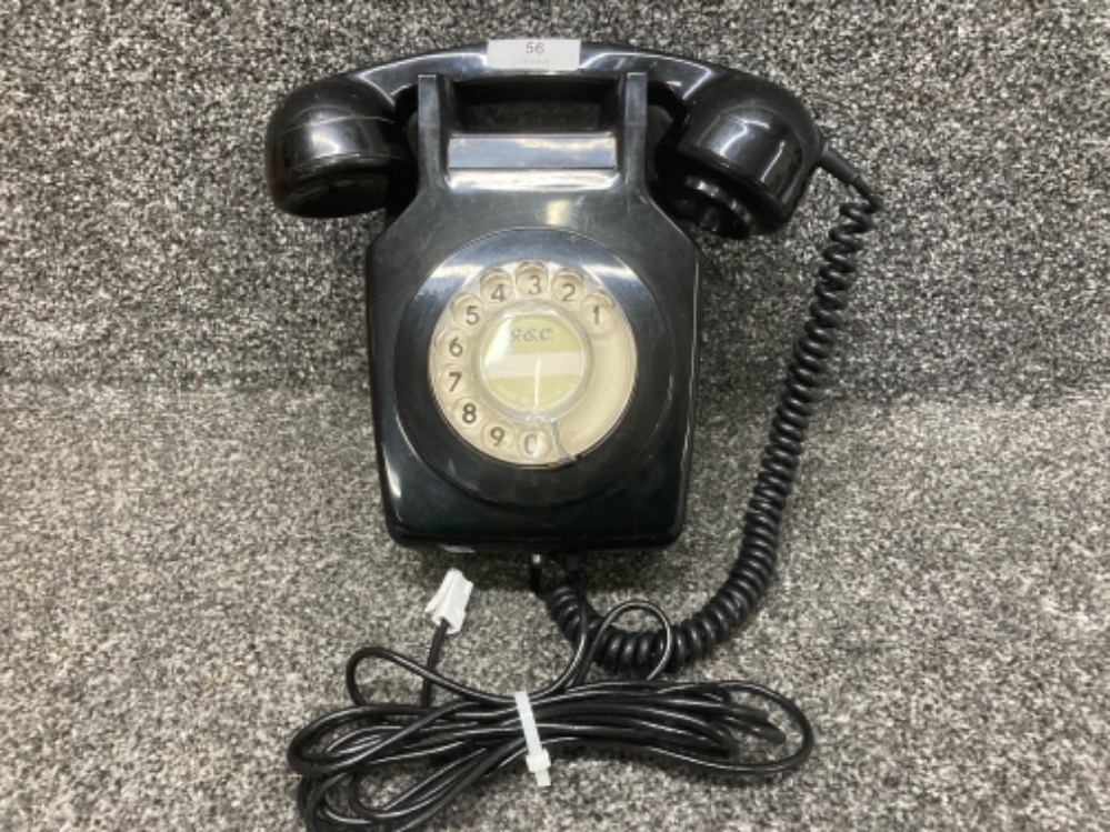 A vintage telephone in black