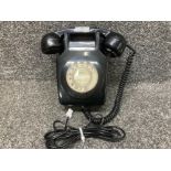 A vintage telephone in black