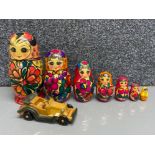 Hand-painted Russian doll babushka doll set, 7 different sizes plus a hand carved old fashioned